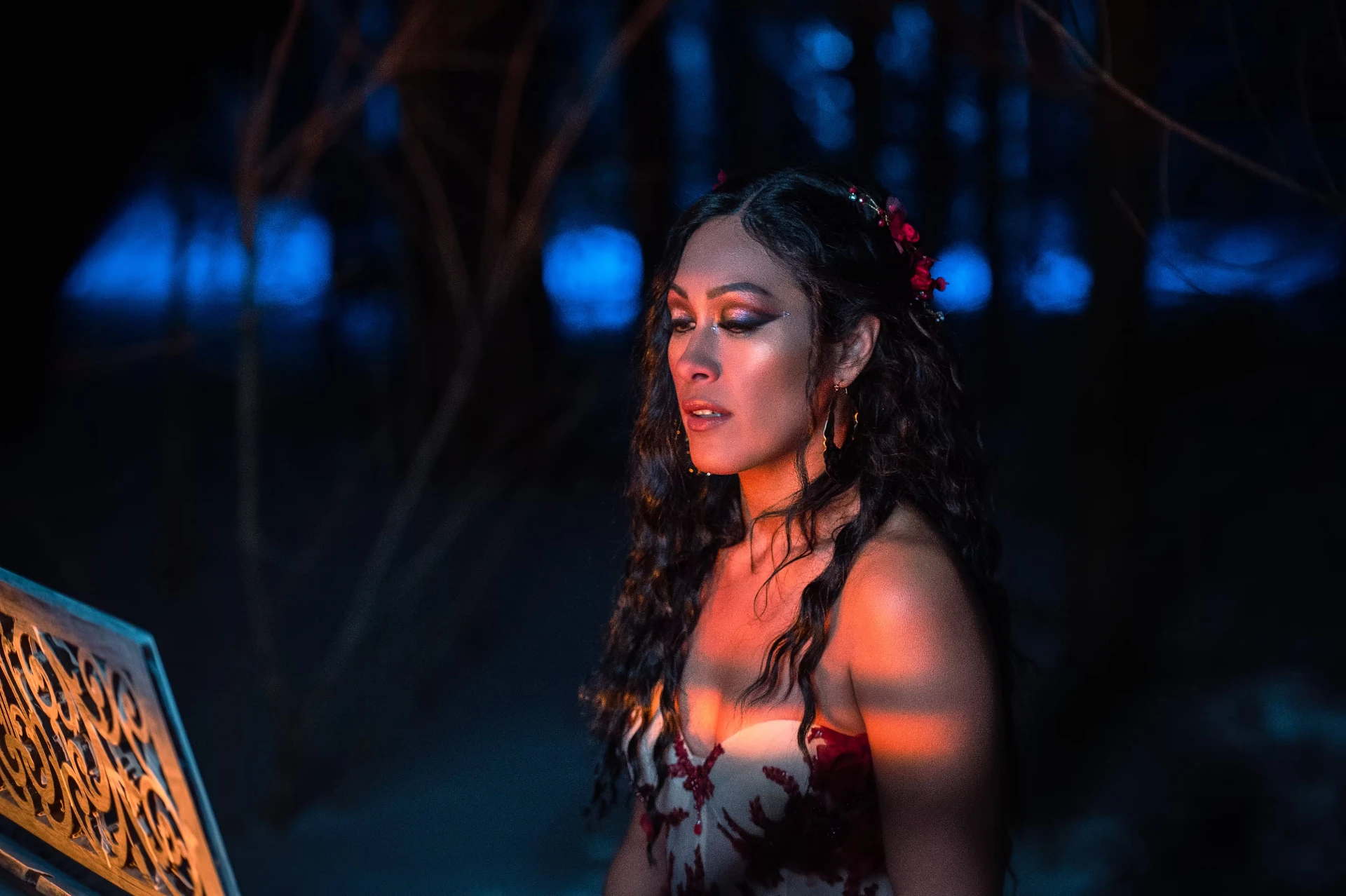 Melina Soochan in a red gown during an evening portrait session